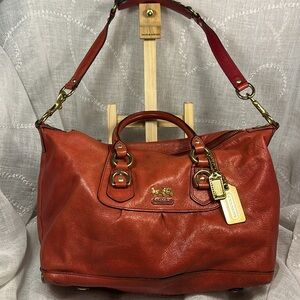 Coach large shoulder leather bag with solid hardware and two iconic tags
